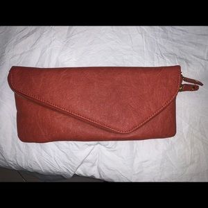 Burnt orange clutch